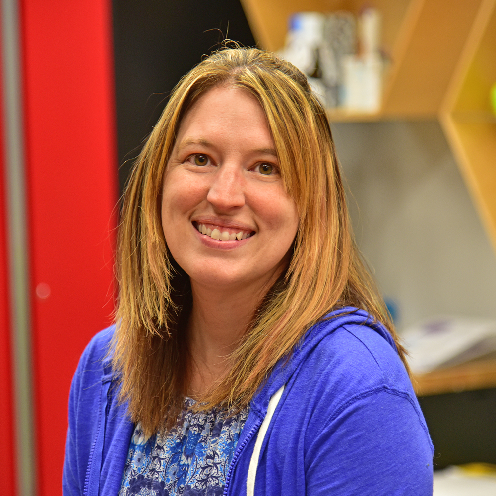 Holly Hunt Woman with blond hair wearing a blue jacket smiling